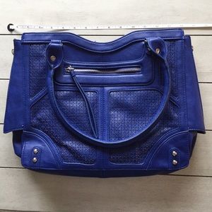 Royal blue laser cut purse